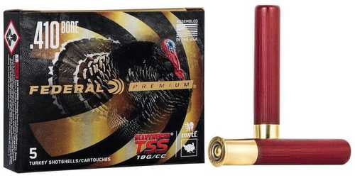 A box of Federal Premium Turkey Heavyweight TSS Shotshell 410Ga 3 13/16Oz #8 (5/ct) by Federal is displayed next to two shotgun shells, one upright and one lying down. The box features a turkey image and bold branding.