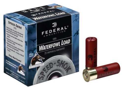 A box of Federal 10 Gauge BB Shot Waterfowl Load SpeedShok (25 rounds) sits next to two red shotgun shells, one upright and one lying down, on a white background. The box displays duck imagery and Federal branding.