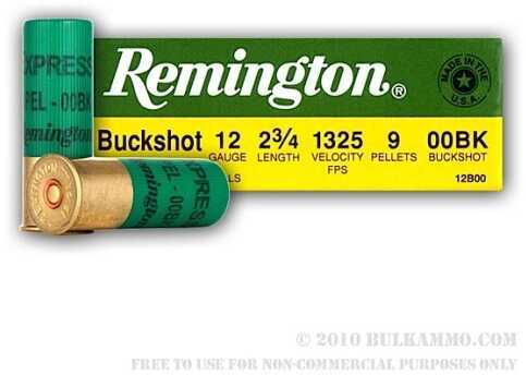 A green Remington 12 Gauge Buckshot Ammunition shell and its box labeled 2 3/4 inch, 1325 FPS velocity, 9 pellets; the box features the Remington logo, Extended Range detail, Made in USA seal, and holds 100 rounds.